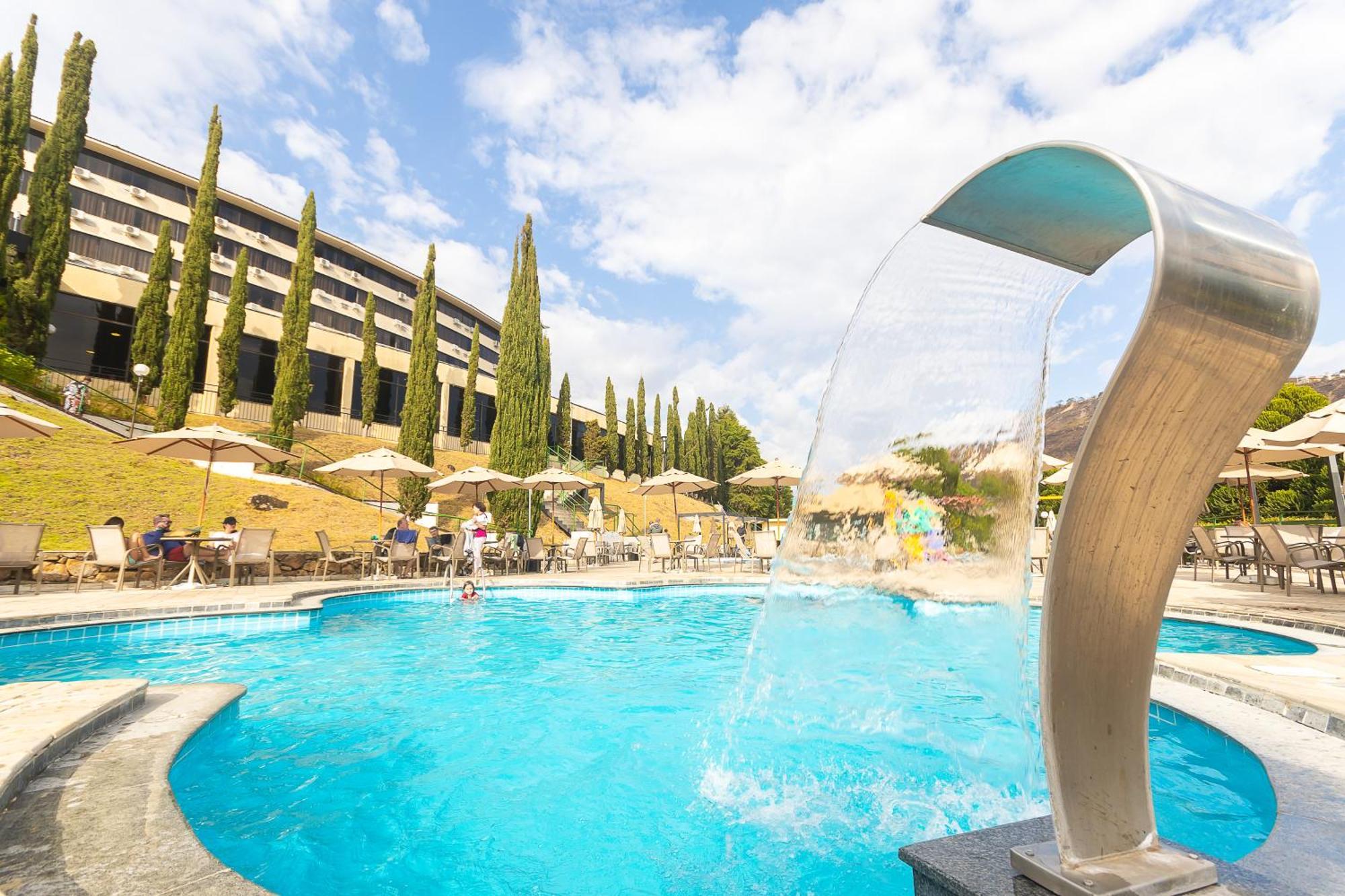 Golden Park All Inclusive Poços de Caldas Exterior foto The swimming pool at the hotel